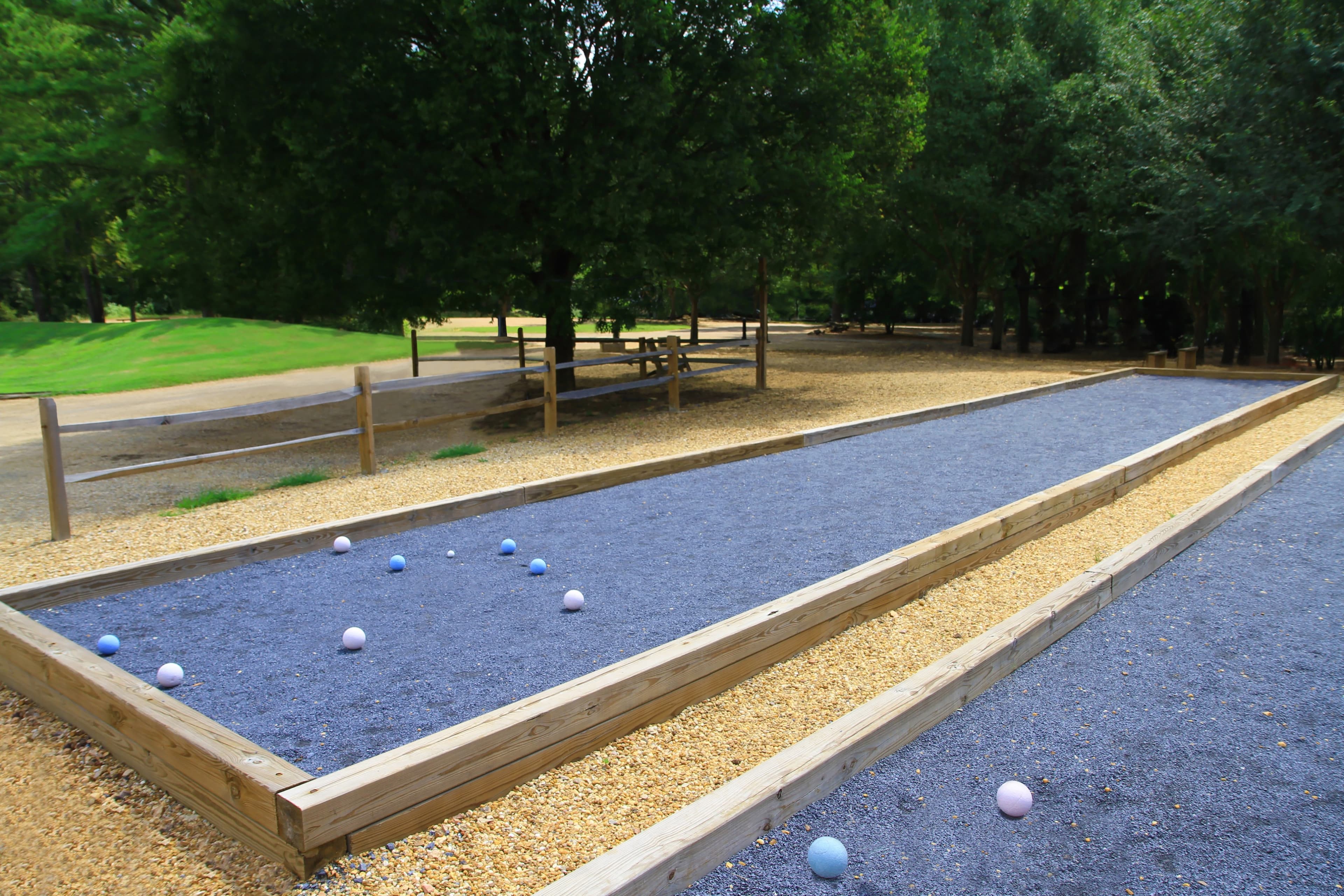bocceball with balls and a fence