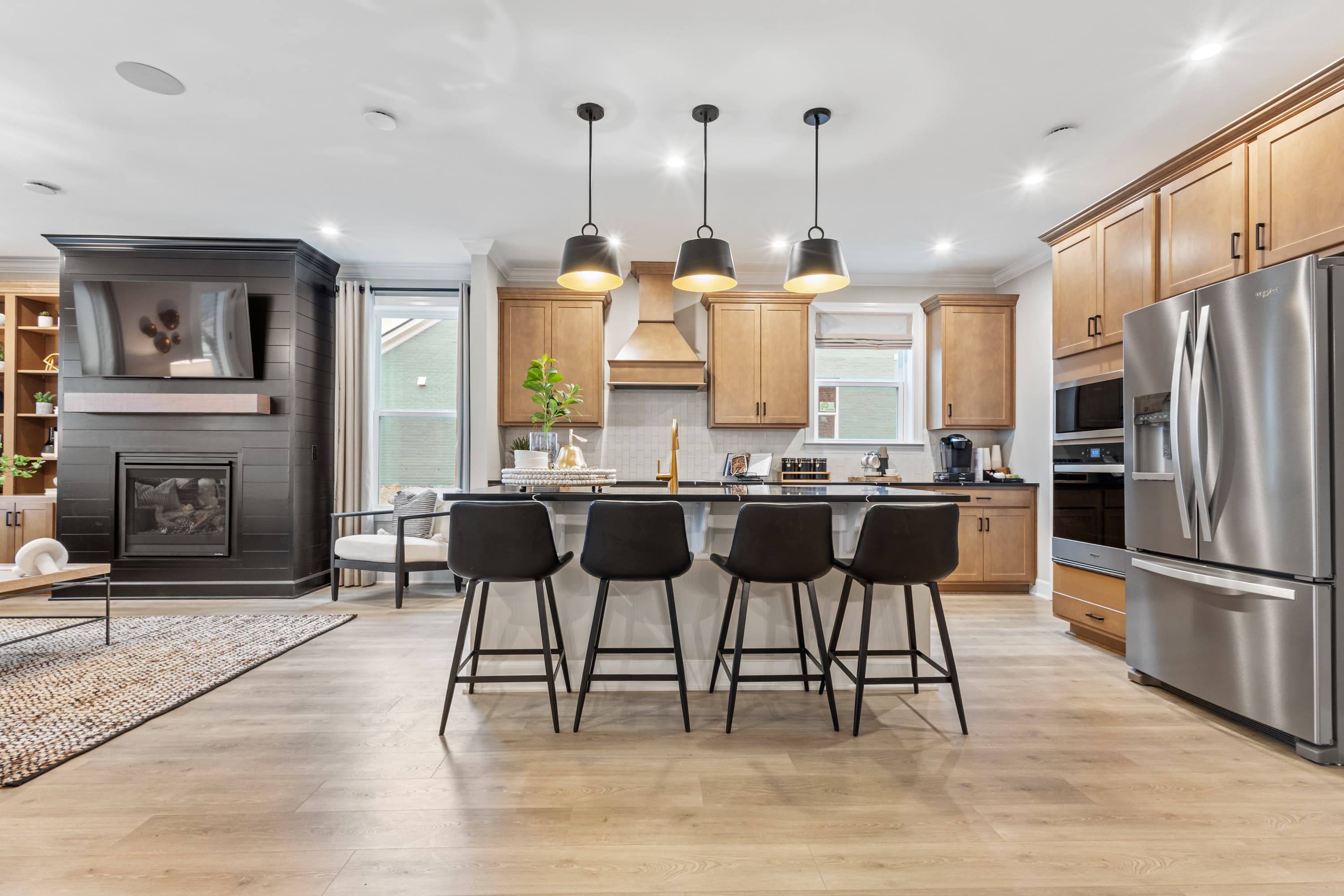 kitchen with a large island and barstools