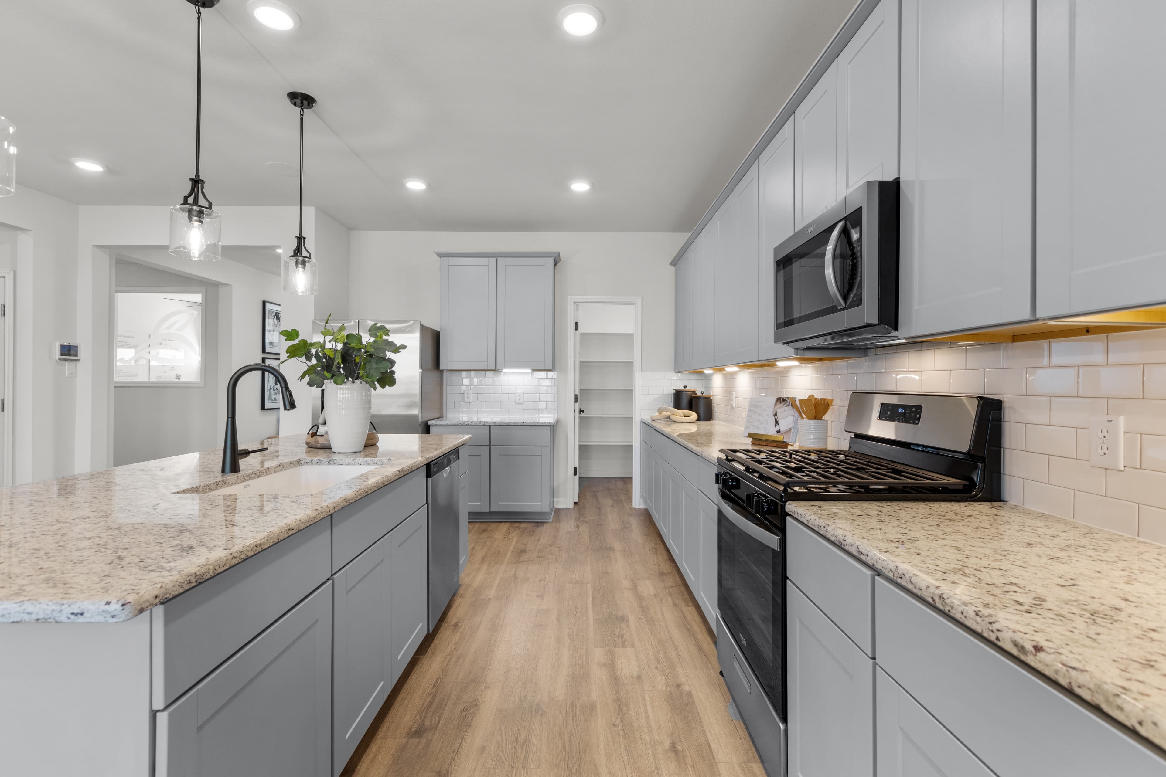 kitchen with granite countertops & wood flooring