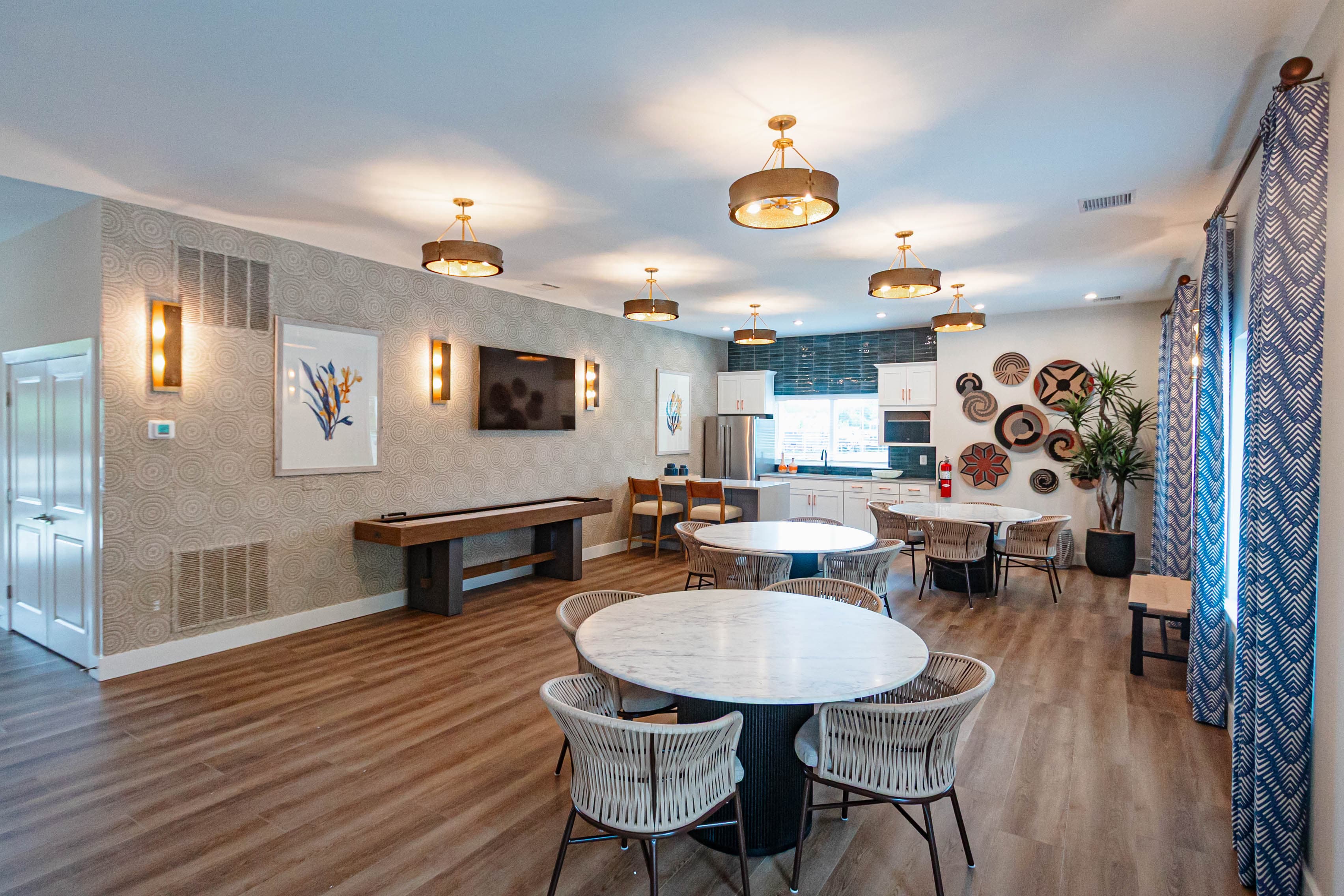 sitting area with tables and warming kitchen