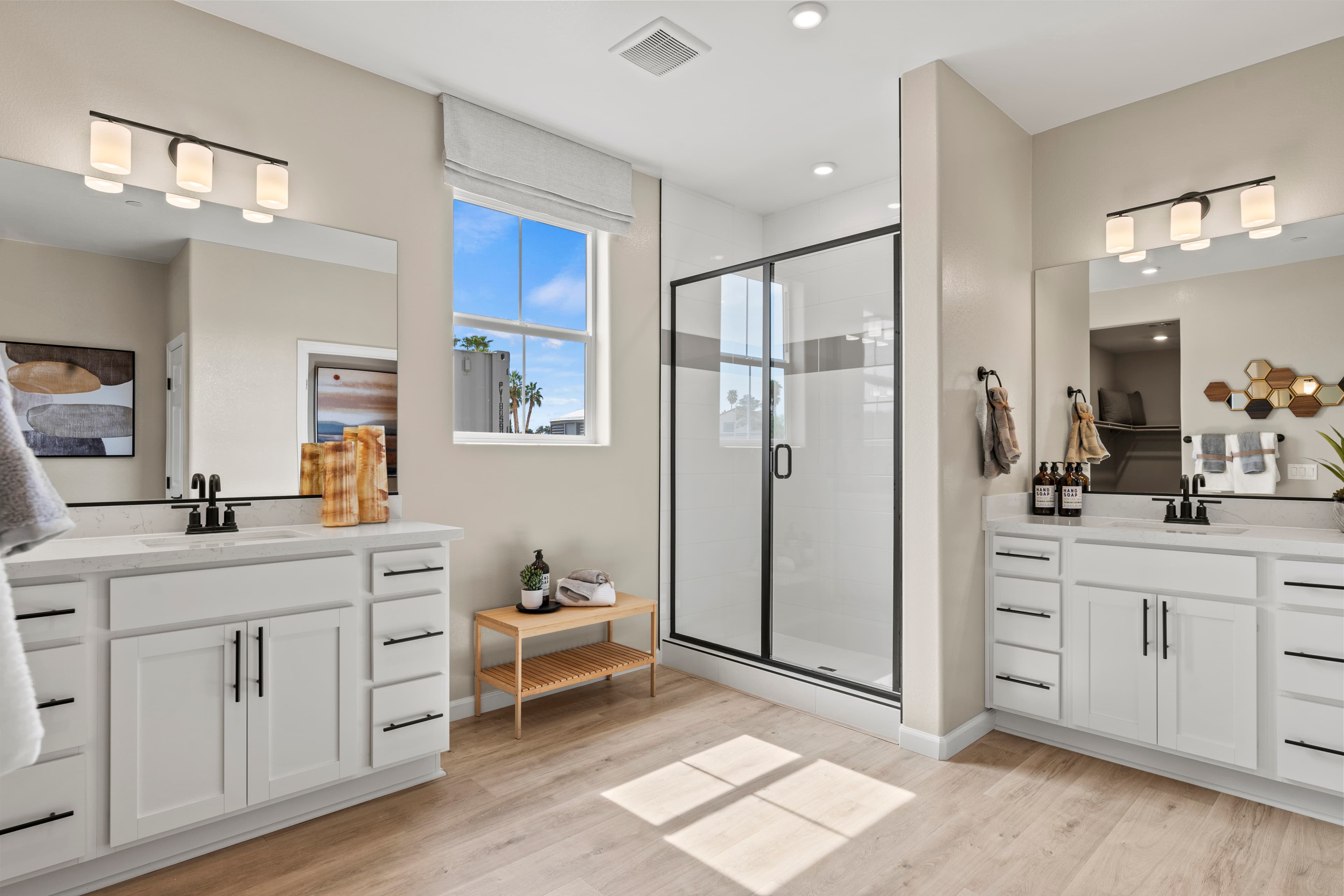 bright primary bathroom with walk-in shower