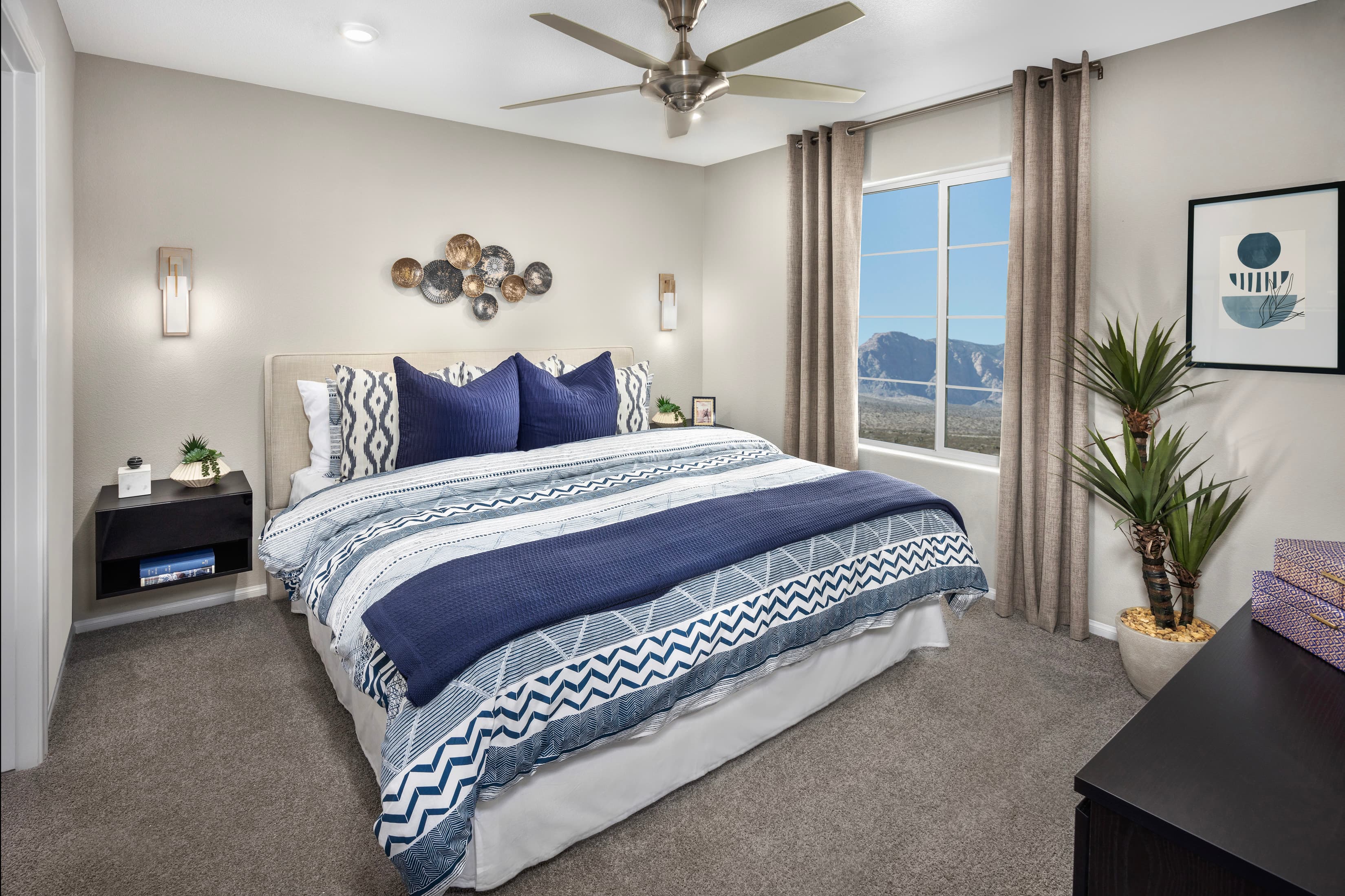 bedroom with bed, grey carpet and large window