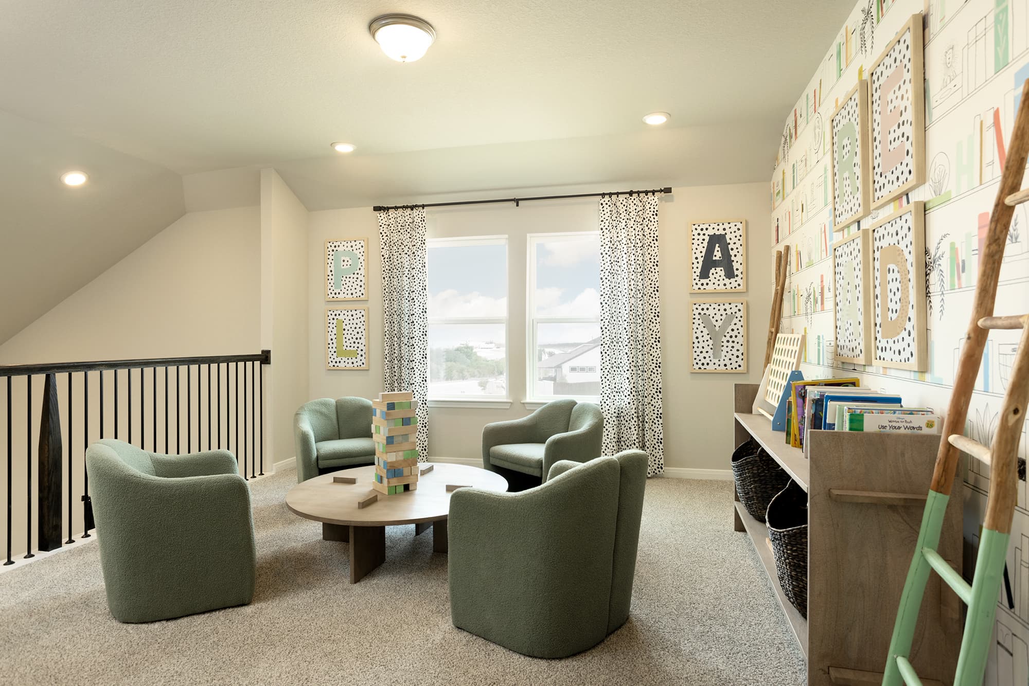 loft with accent wall, carpet, games & table