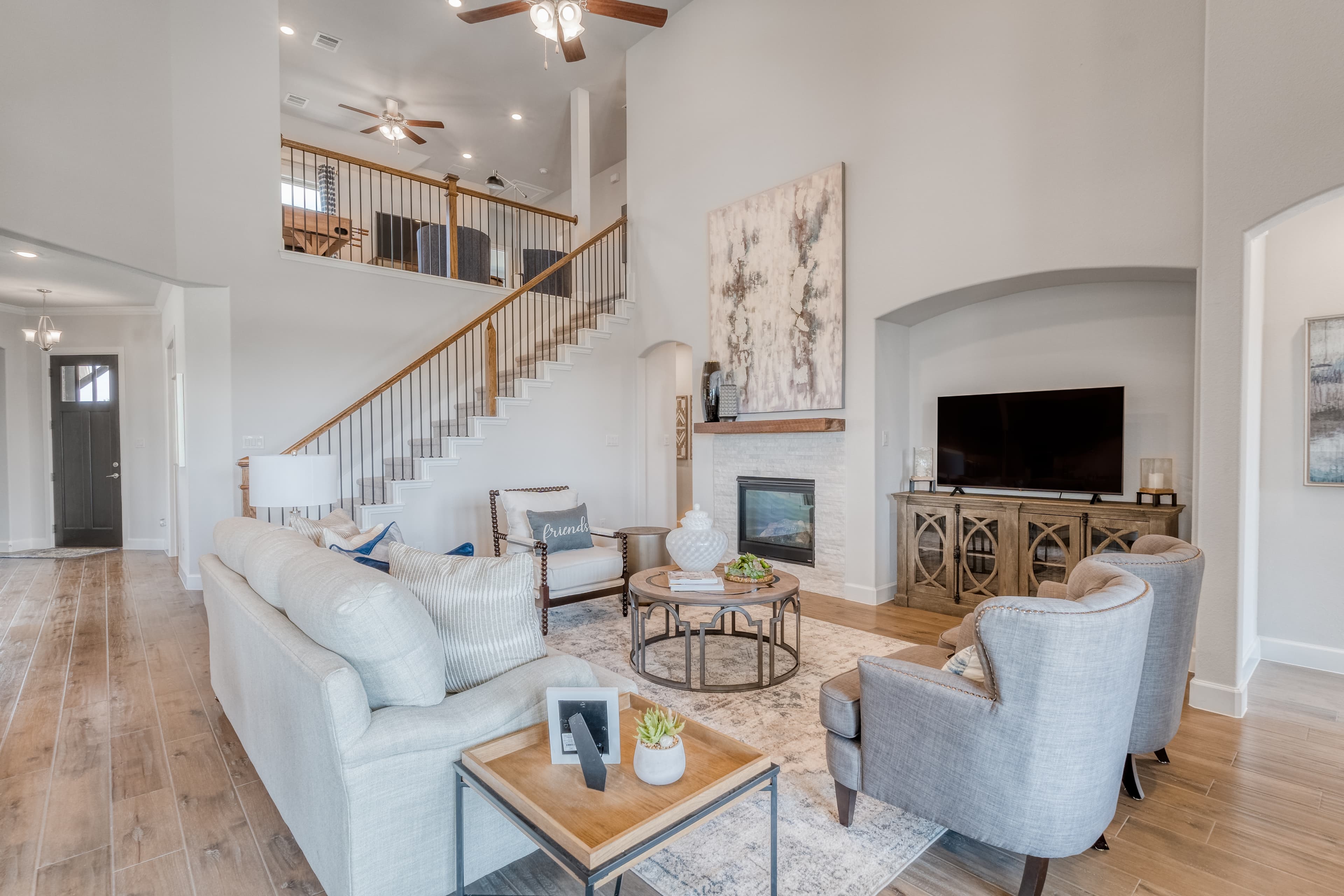 large great room with two-story ceilings