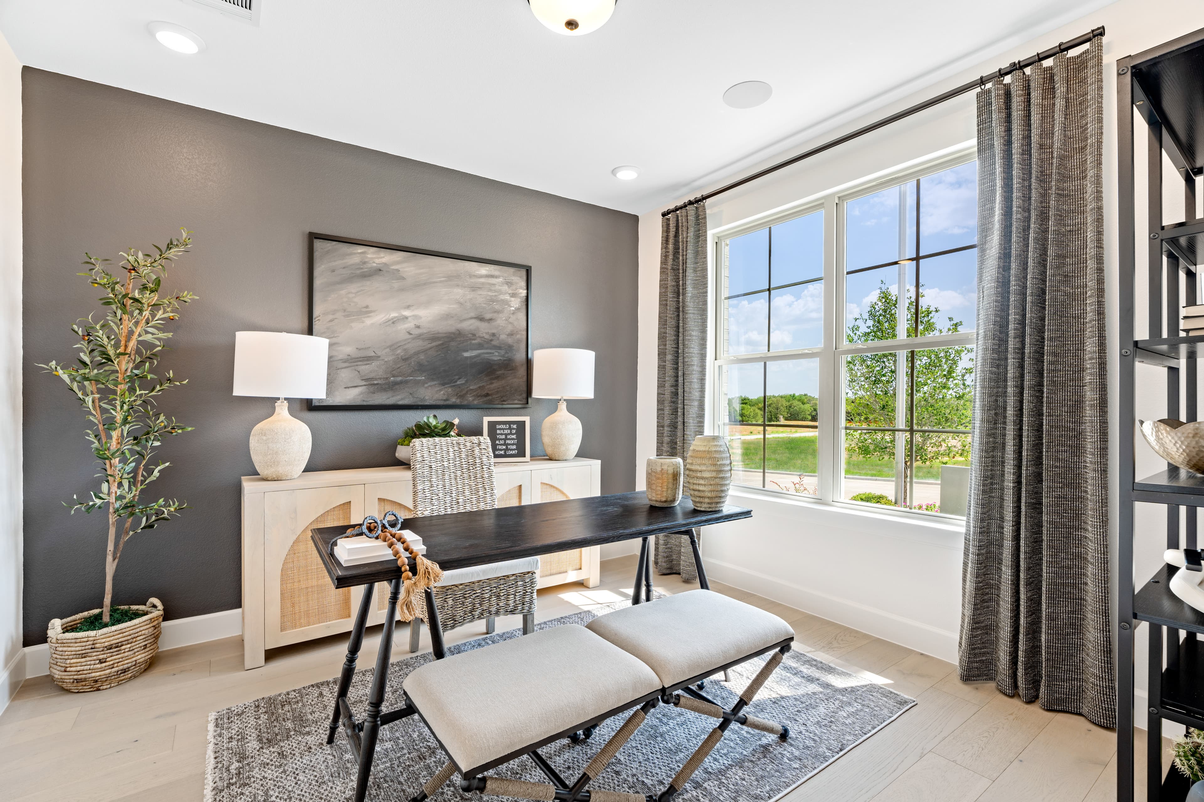 private study with windows and wood floors