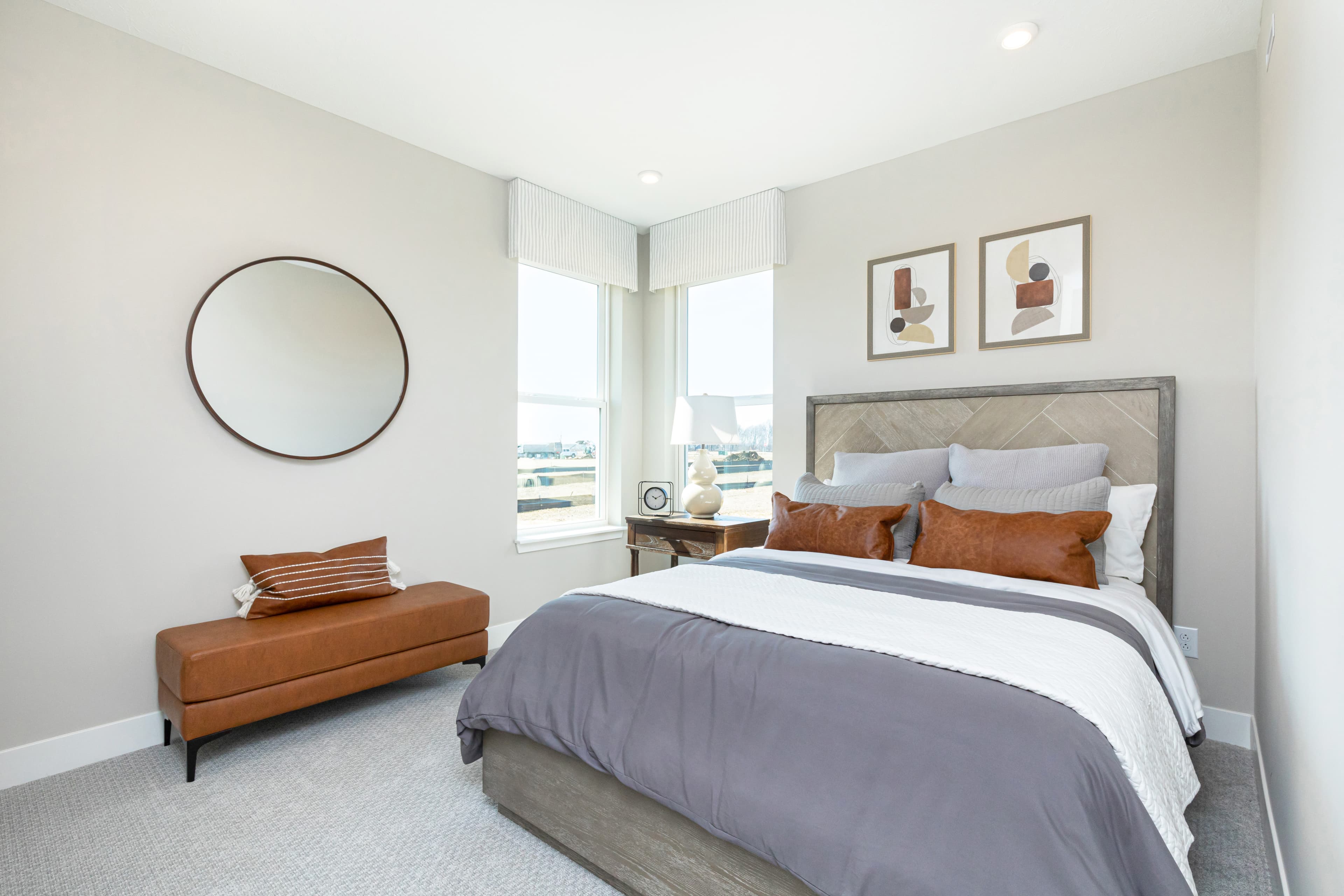 bedroom on the main floor with two windows 
