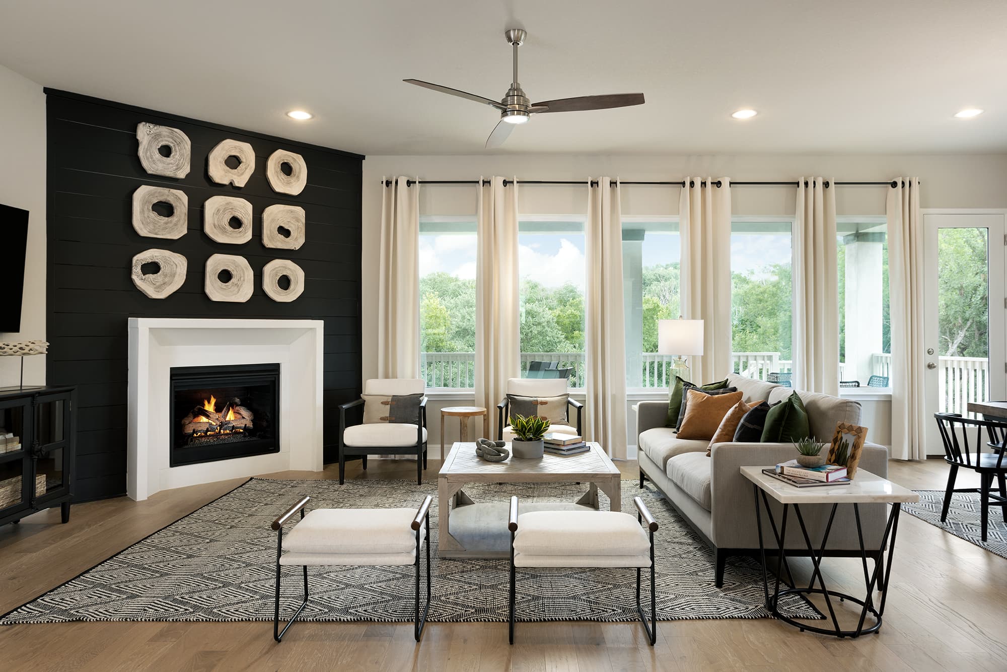staged great room with large windows