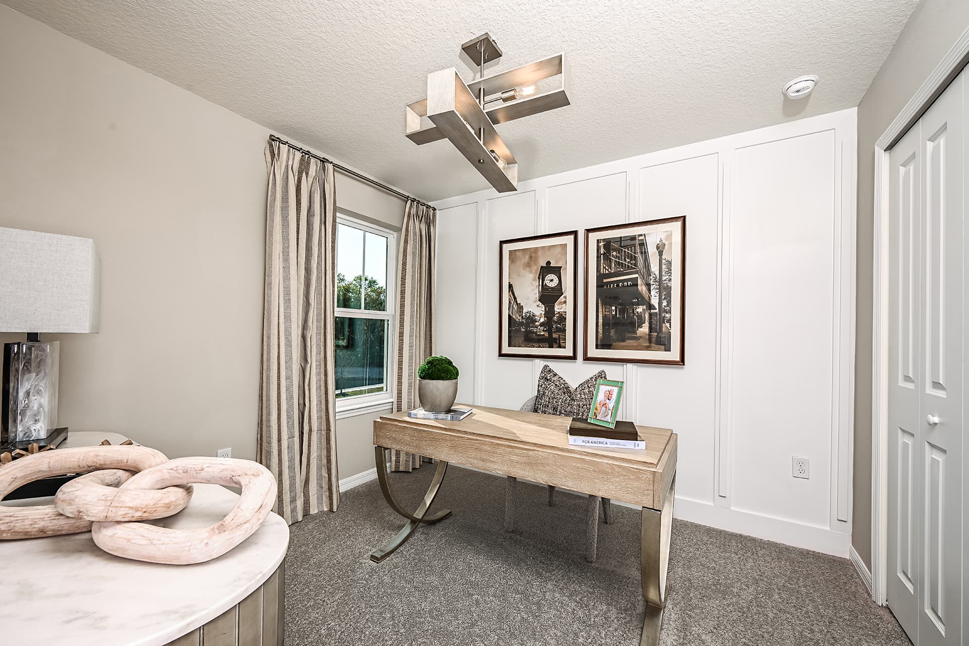 secondary bedroom with carpet, desk, and chair