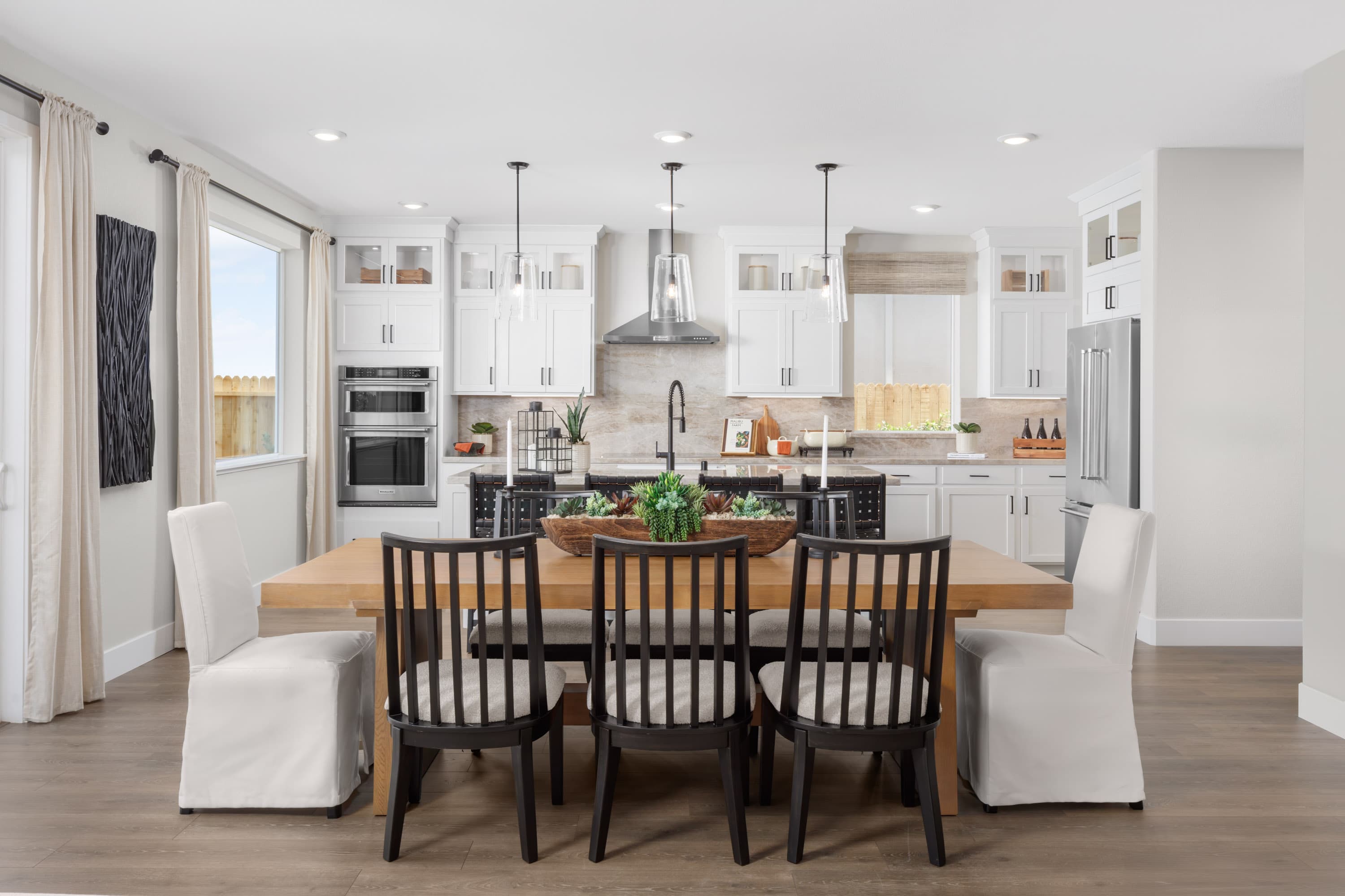 dining room with wood table, and seating for eight