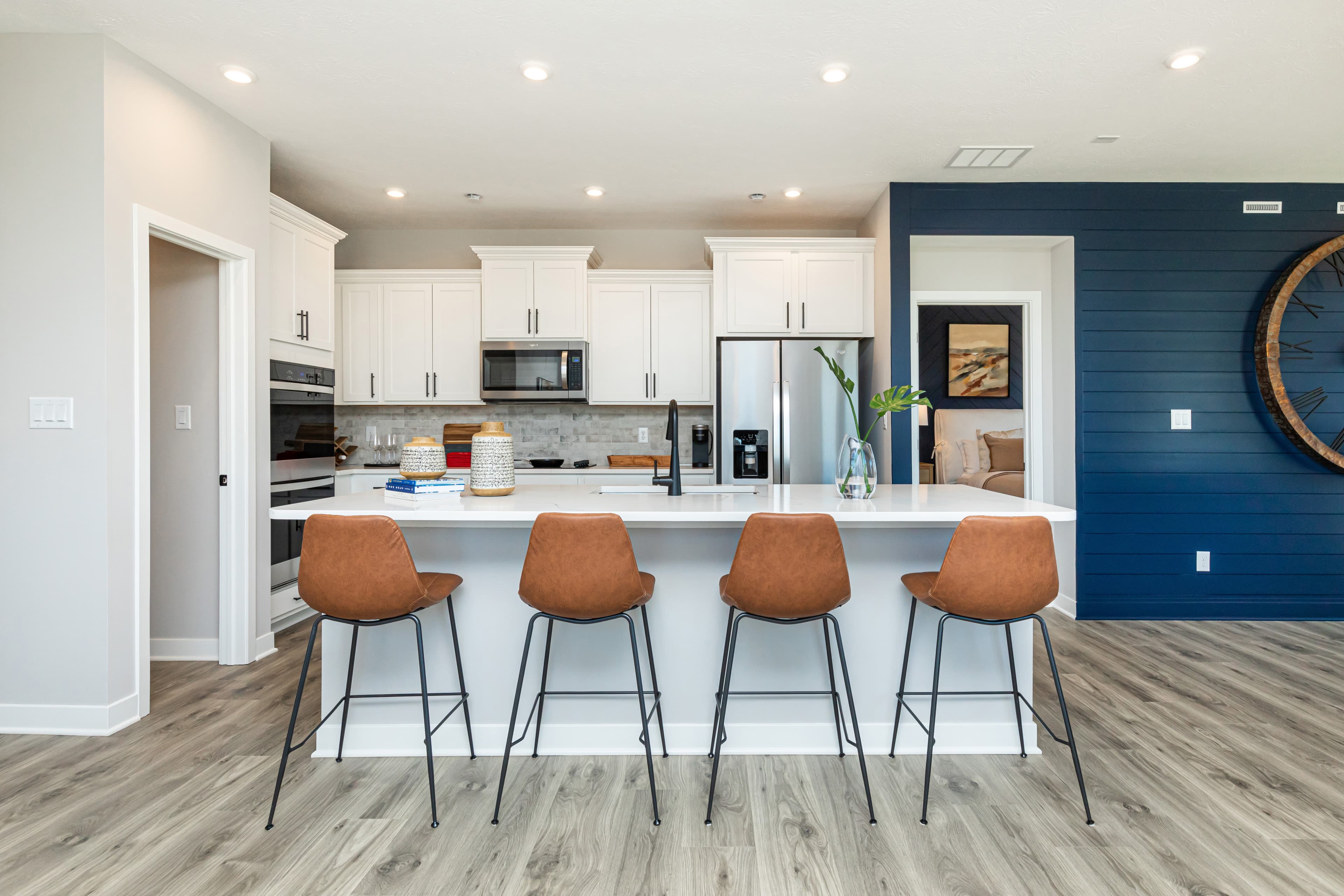 kitchen with island and bar stools 