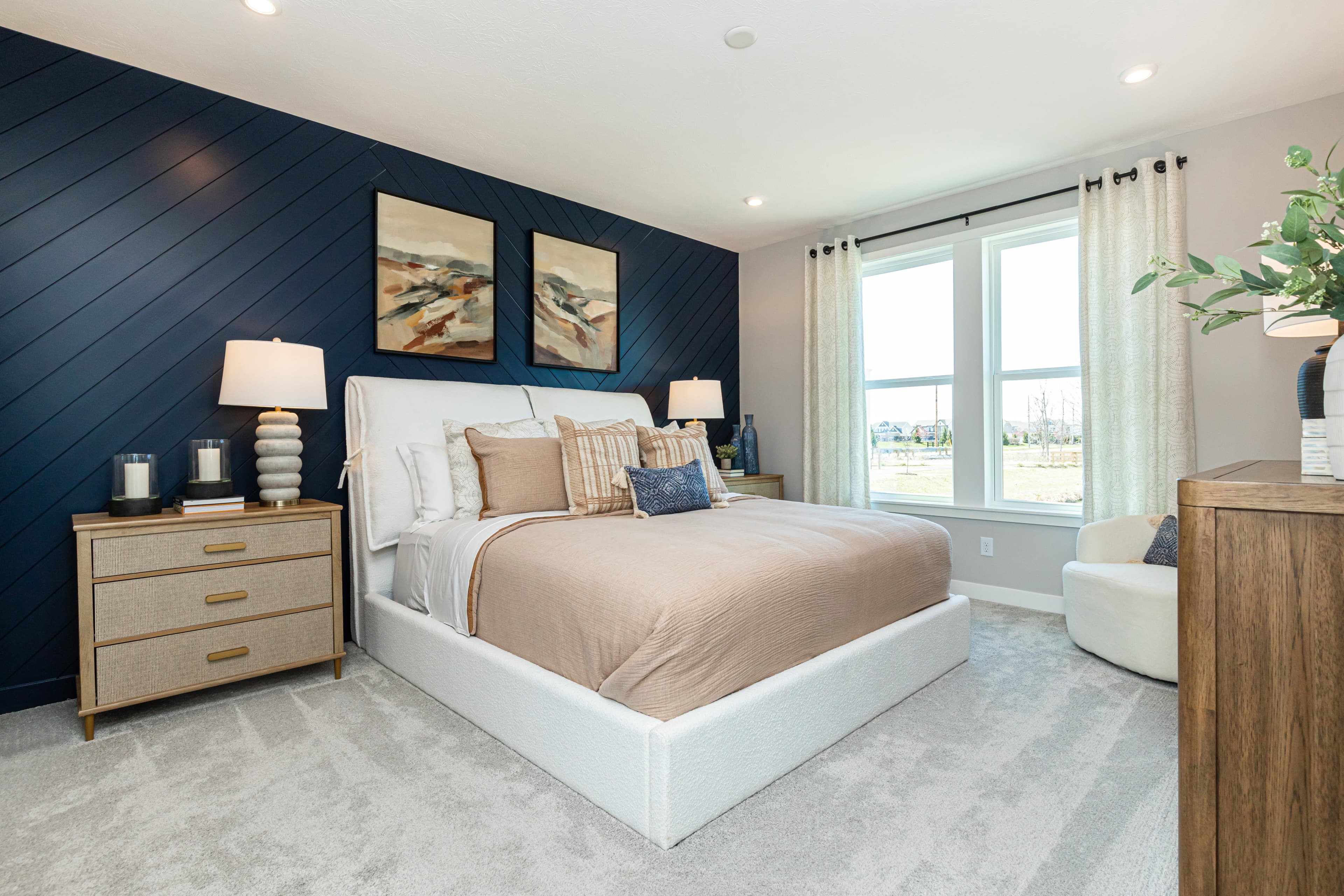 main-floor bedroom with two windows 