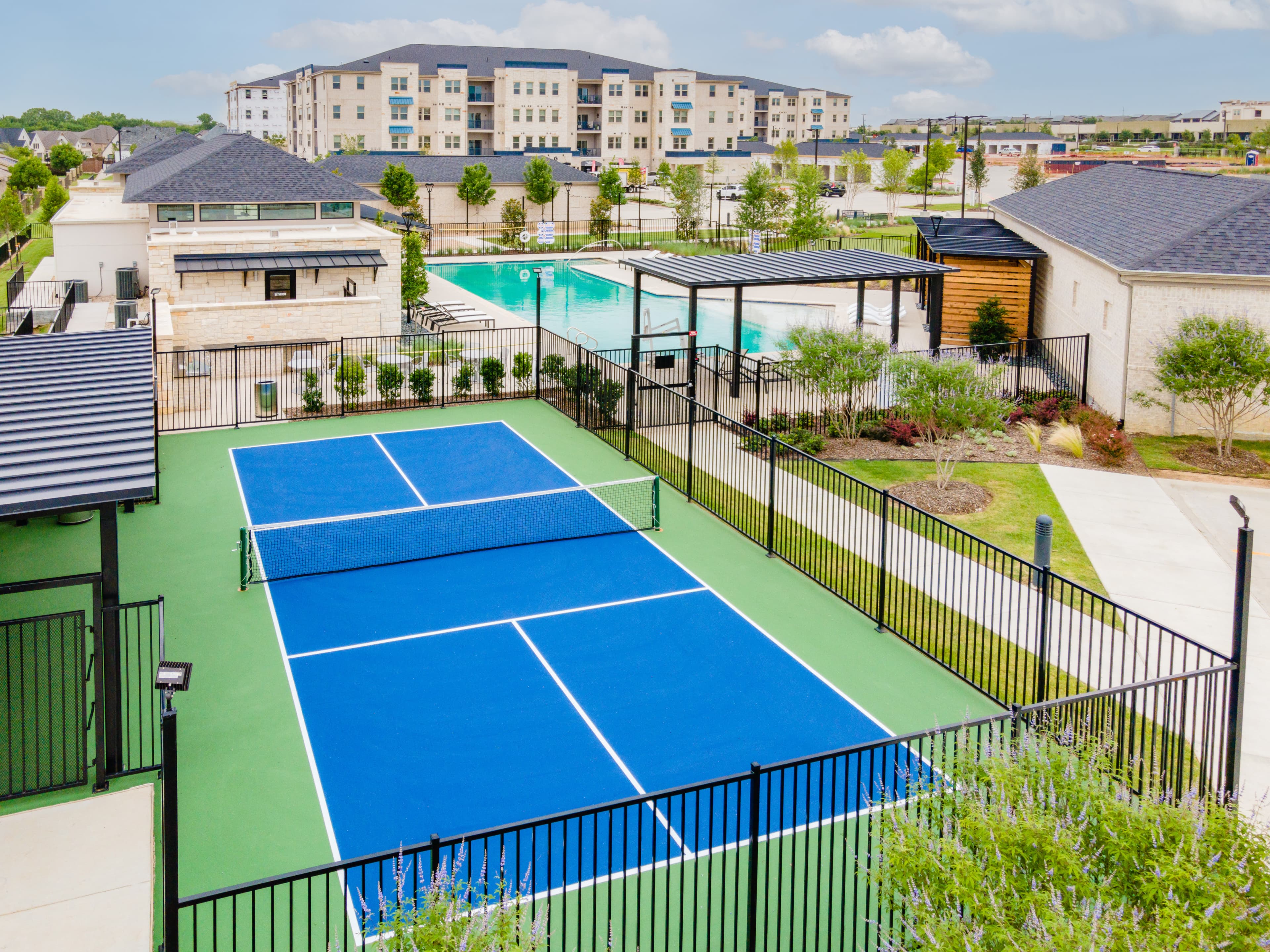pickleball court next to pool area