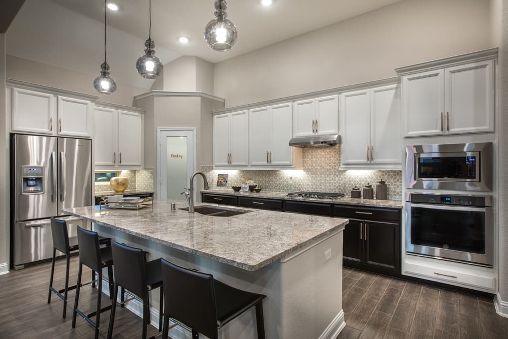 kitchen with large island and two-tone cabinets