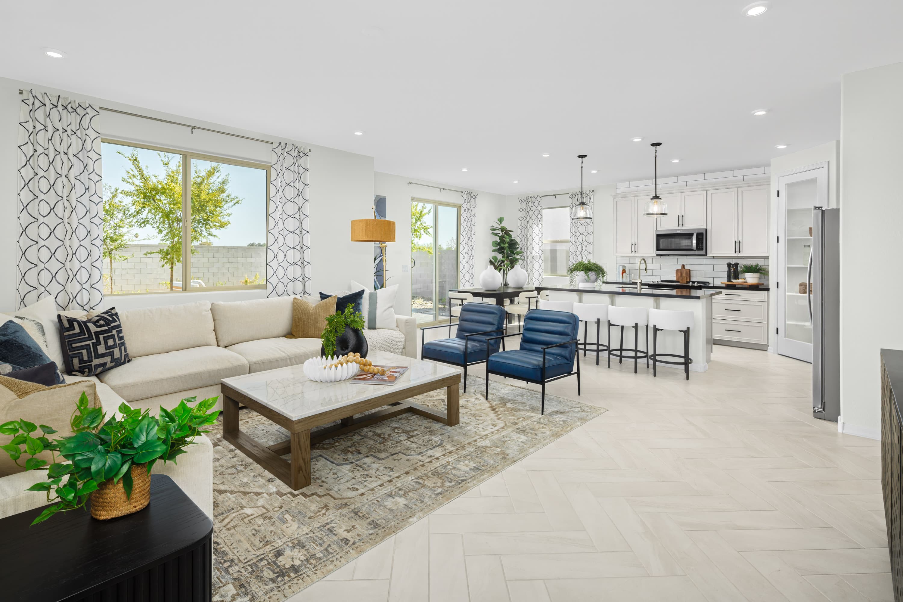 spacious great room with sofa, and chairs