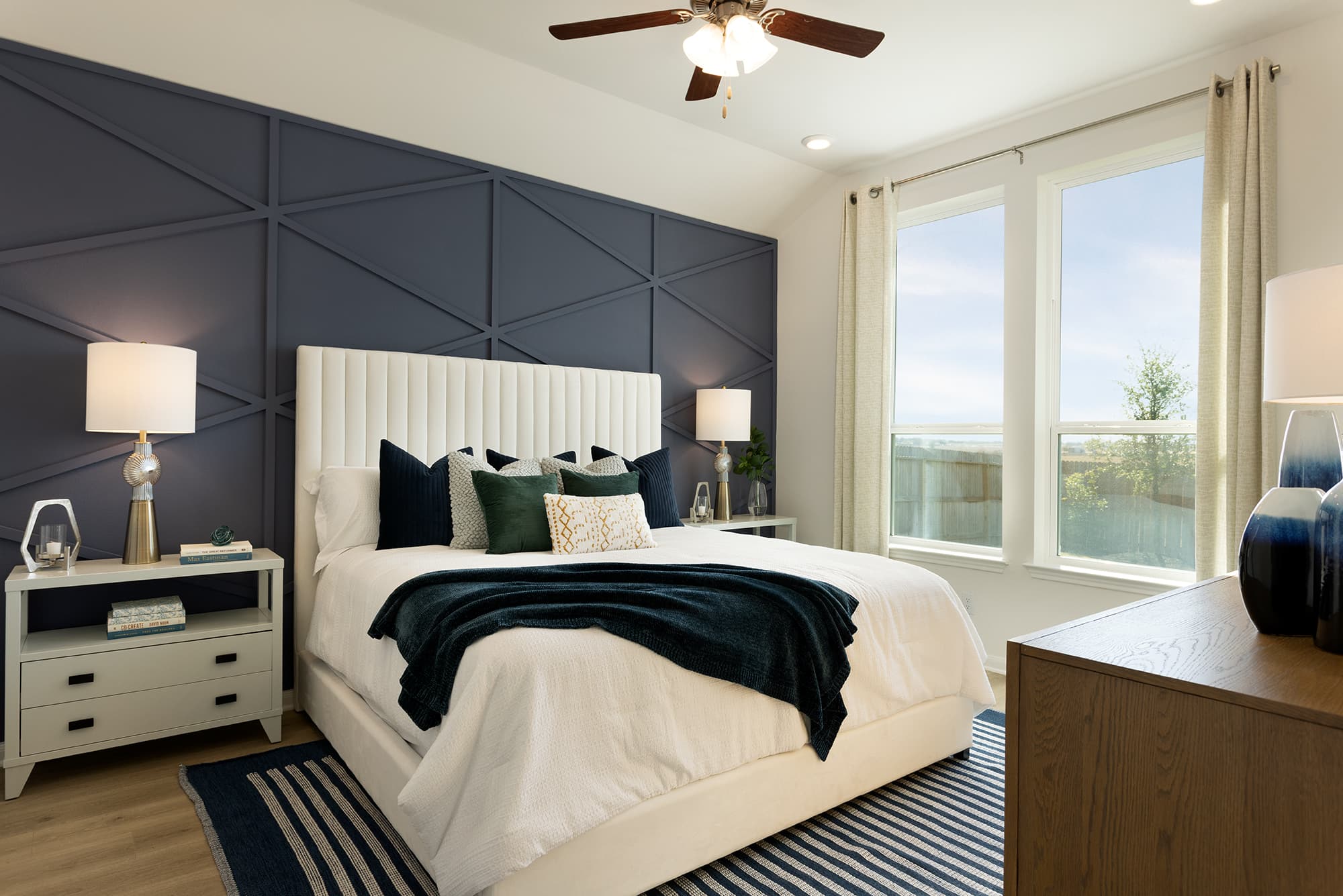 bedroom with window to the backyard & carpet