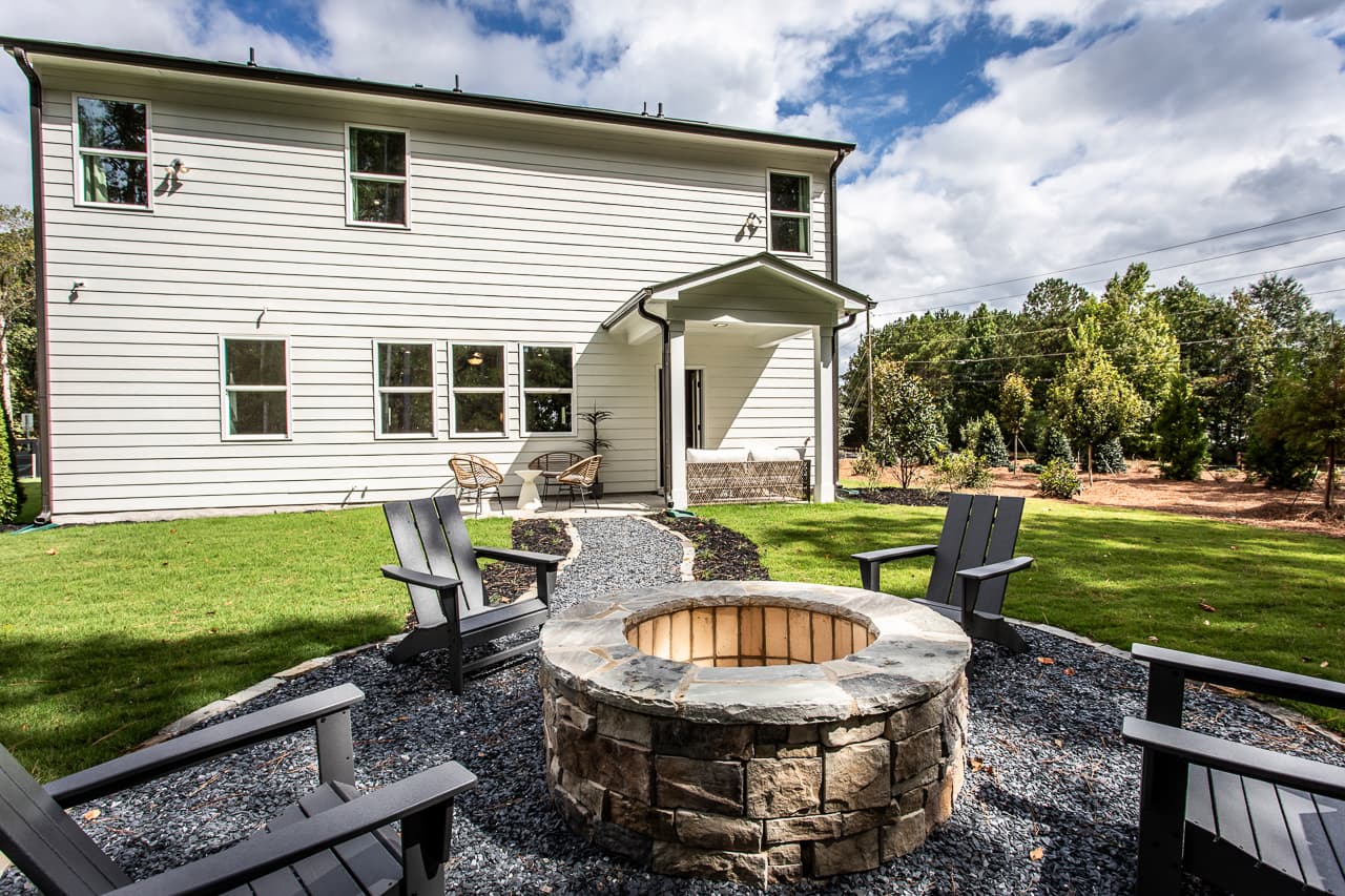 backyard with outdoor firepit & patio furniture