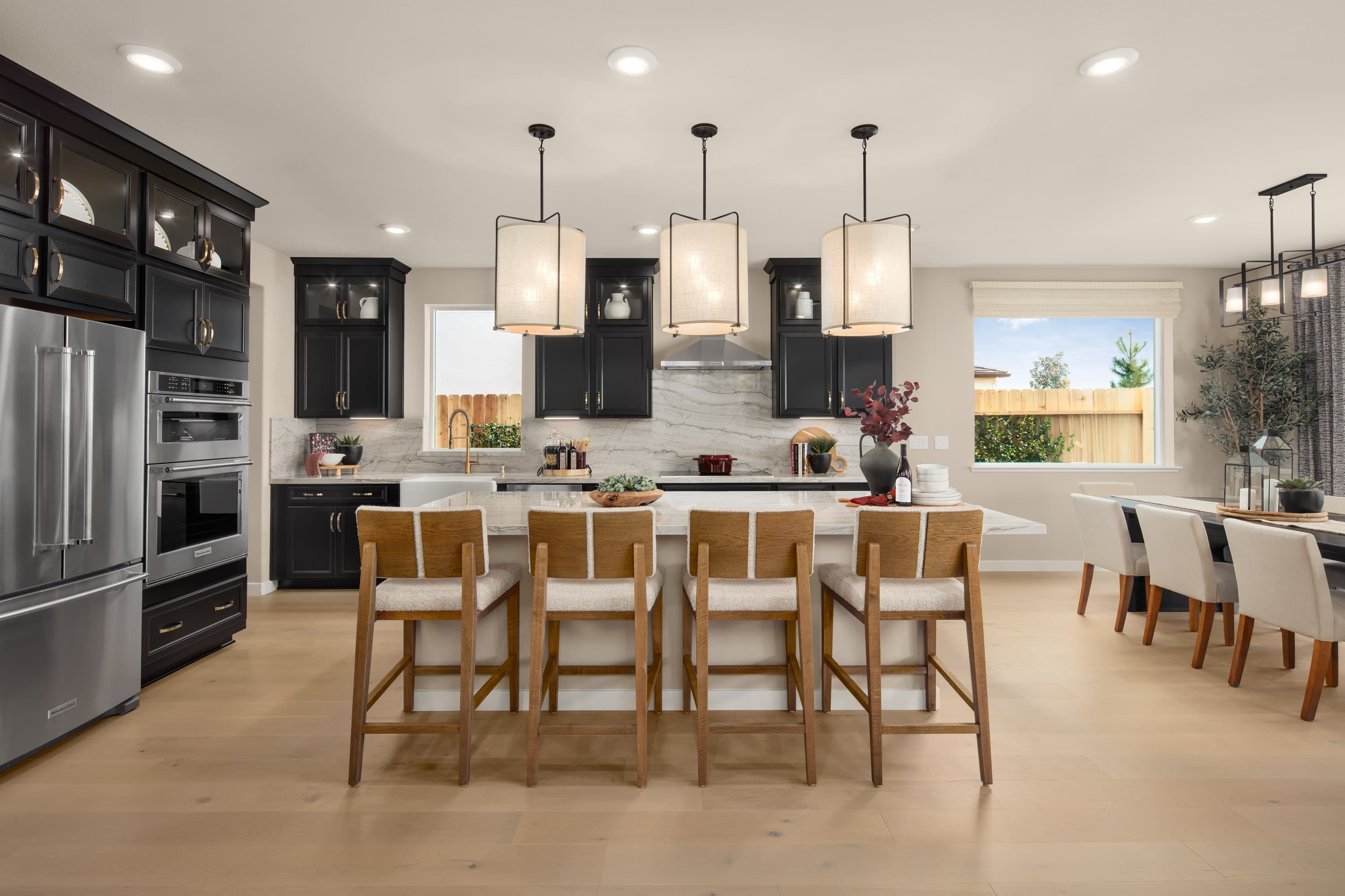 kitchen with espresso cabinets and wood floors