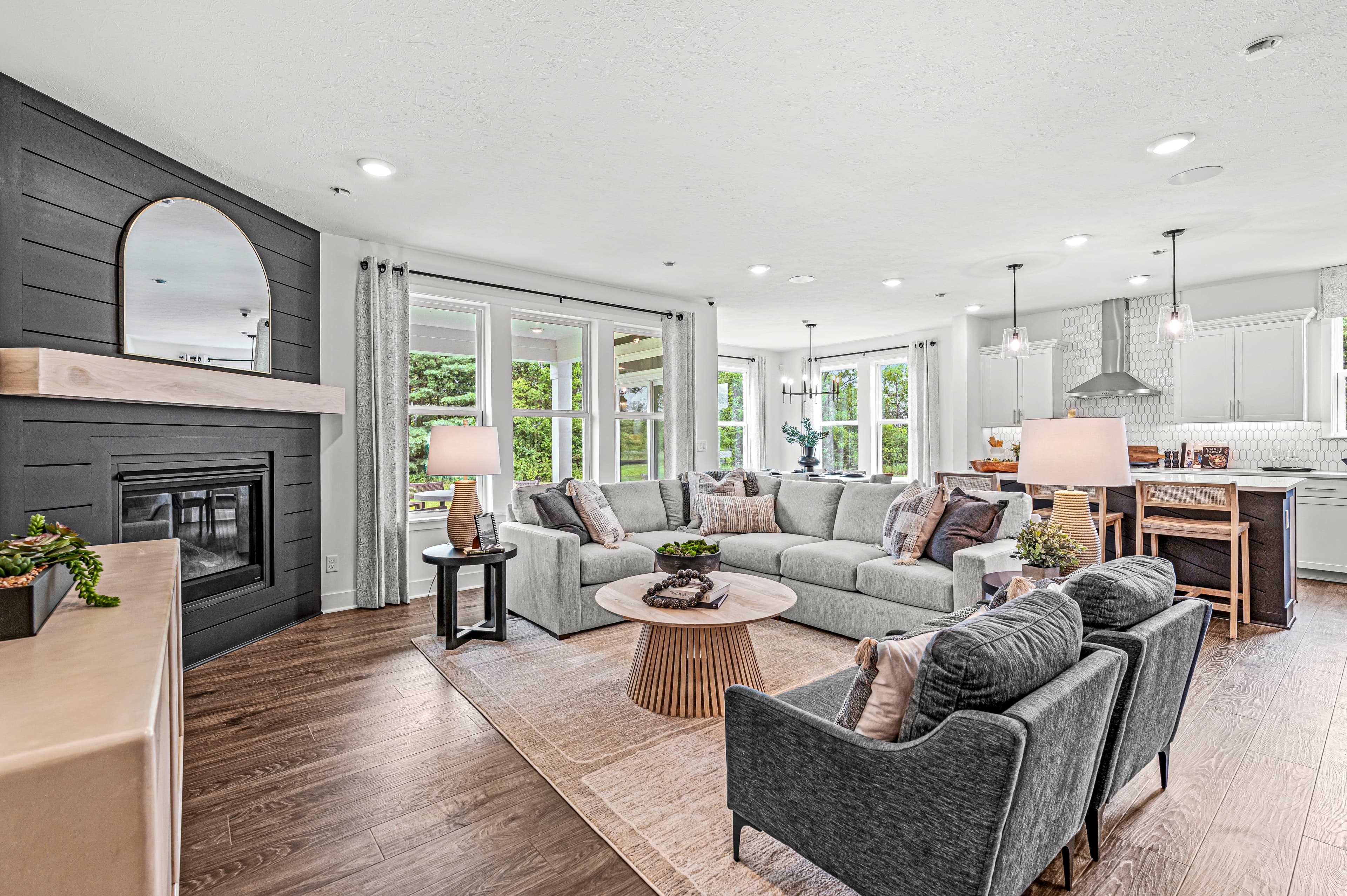 great room with fireplace and hardwood floors 