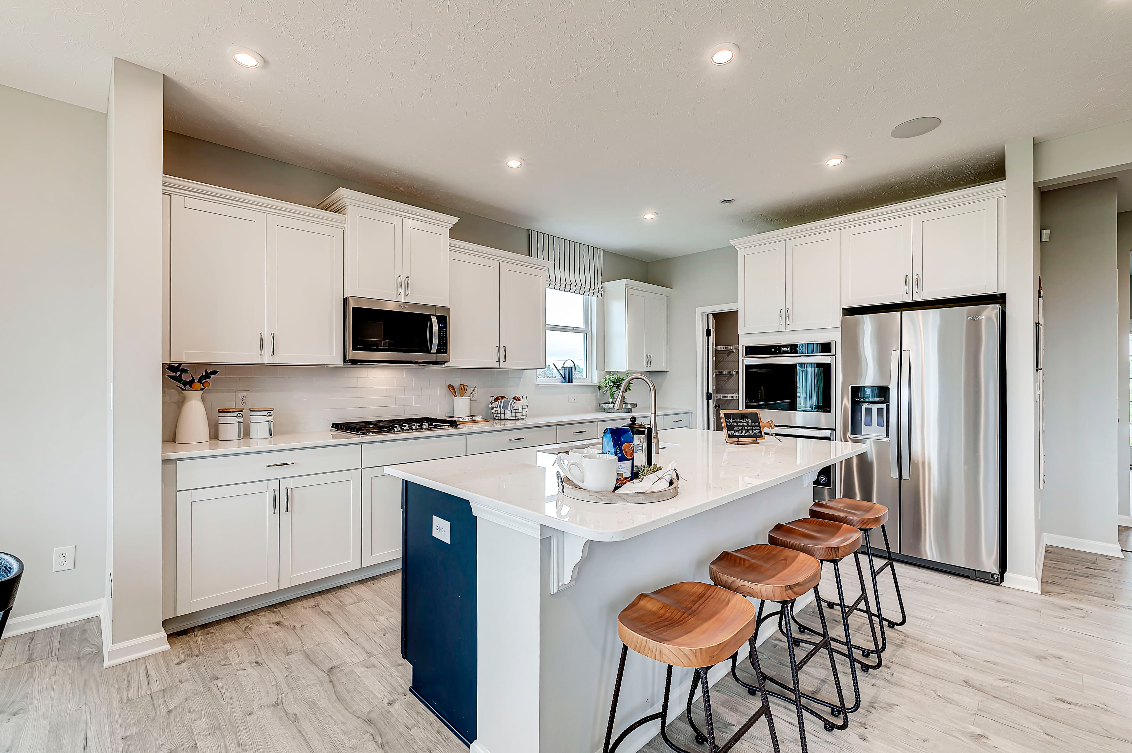 open kitchen with spacious island and bar seating 