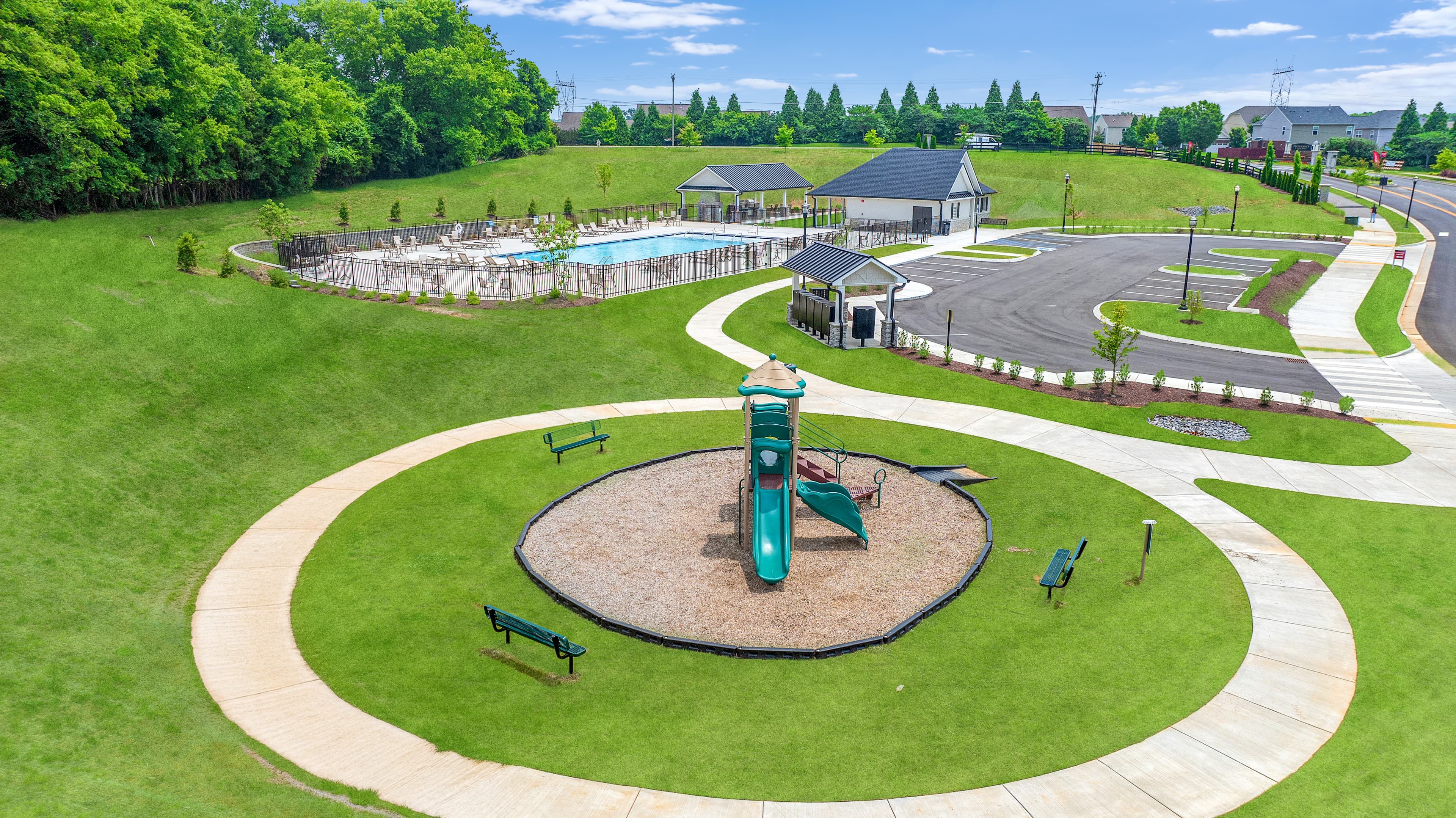 amenities with playground, pool, and clubhouse