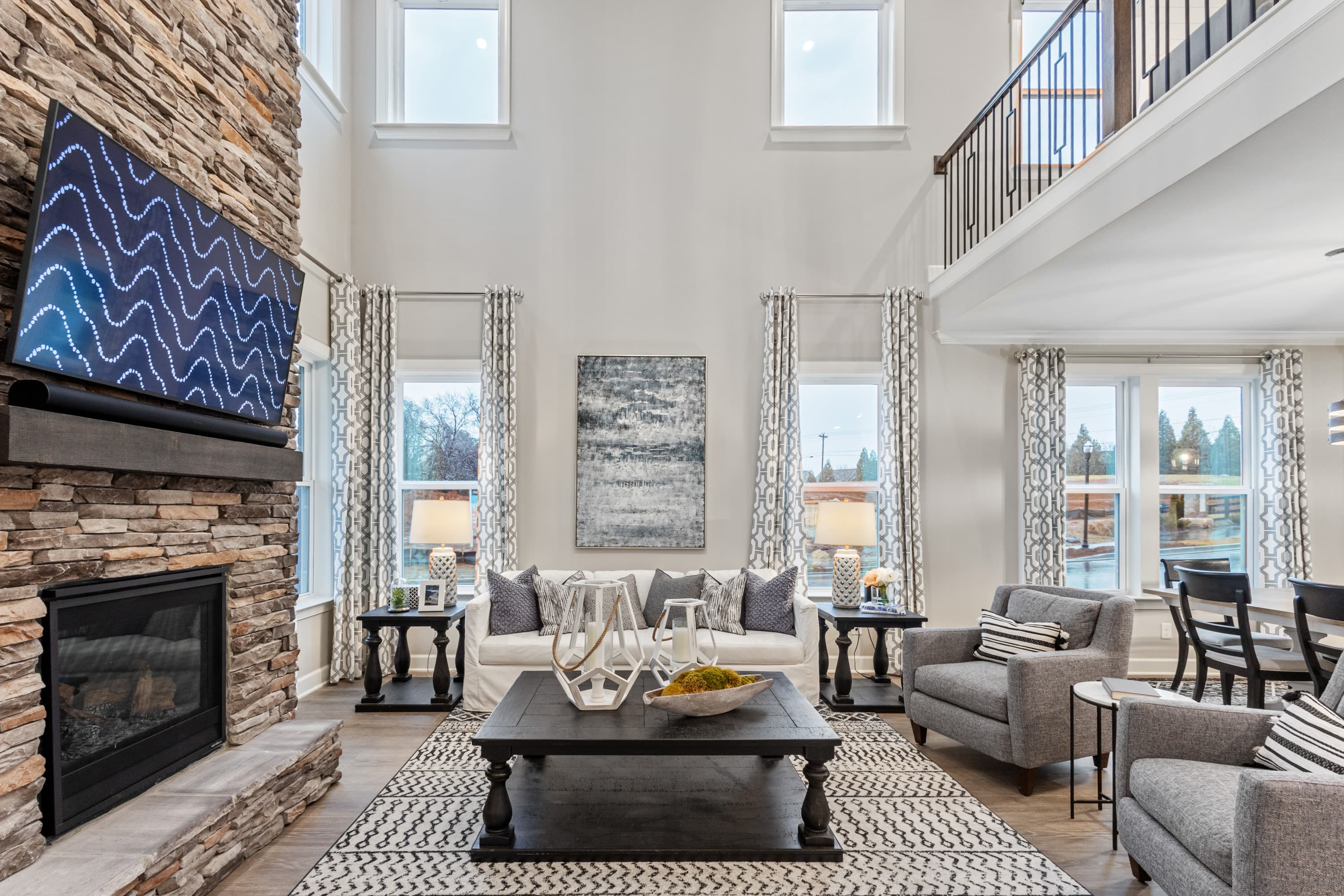 great room with stone fireplace