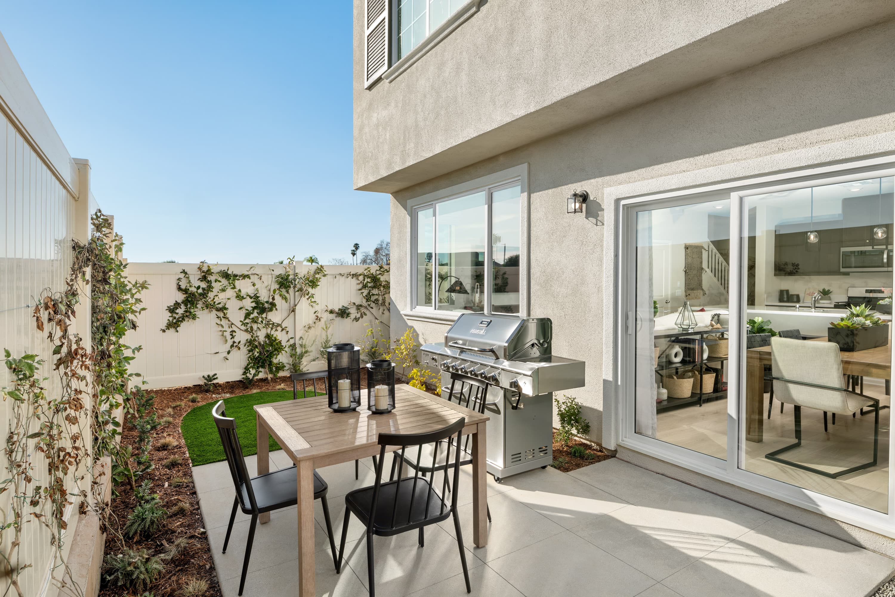 backyard with grass and sitting area